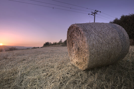 A Round Hay Bale Taken At Sunset Near Spinkhill, North East Derbyshire