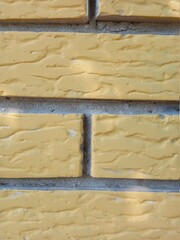 Background of texture photo.  Stone wall as a background or texture. High quality photo. Walking and finding texture. A beautiful colored mosaic.