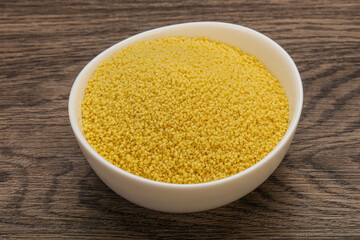 Raw cous cous heap in the bowl