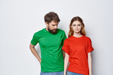 Obraz premium a young couple hug friendship colorful t-shirts family light background