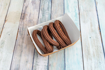 chocolate covered churros takeaway carton tray