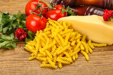 Raw Italian pasta Fusilli for cooking