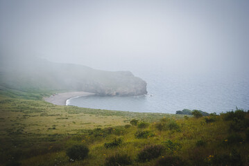 Bay in fog on the Krabbe Peninsula, Primorsky Krai (Primorye) Far East, Russia