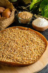 Kue Hok Lo Pan or martabak bangka. The martabak bangka batter is made from a mixture of flour, eggs, sugar, baking soda, coconut milk and water.The batter is cooked upon a thick round iron frying pan 