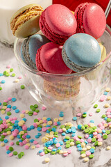 delicious multicolored macaroon with small candies