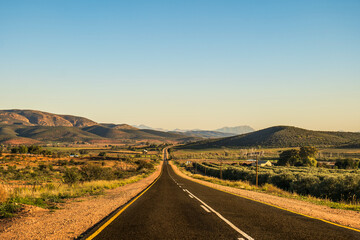 Fototapeta na wymiar scenic route 62 through beautiful countrysides, rolling hills and meadows in western cape South Africa