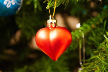 christmas decor, toys, bows, glass balls, bokeh, background, toys, merry christmas, happy new year. 2022. Lights, sparkles and glare, snow. 