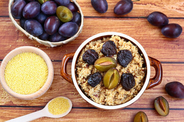 Millet with plums. A warm autumn breakfast