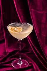 dirty martini garnished with a lemon