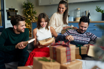 Friends and boxes with Christmas presents