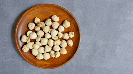 Dried candlenut seeds yellowish white
