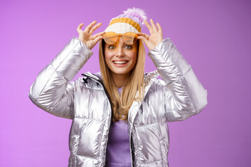 Amazed attractive fascinated young female traveler take off sunglasses check-out stunning perfect...