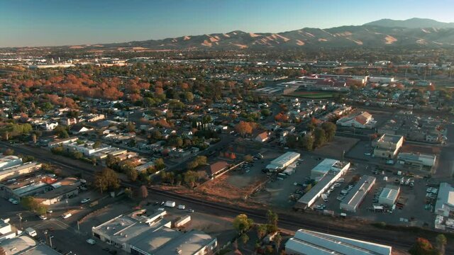 Aerial: Flying Over The Town Of Pittsburg At Sunset, California, USA