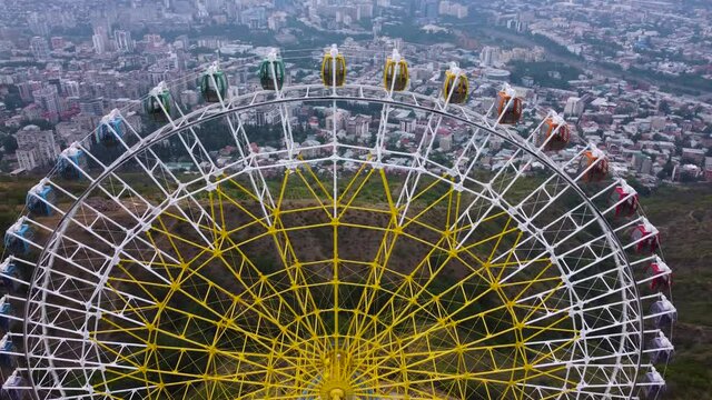 Ferris wheel and city view from top