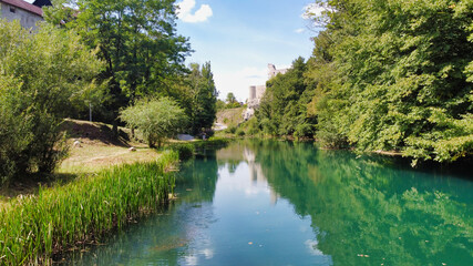 View of the Slunjčica river and Stari grad (castle) Slunj. Beautiful water color. Croatia. Europe