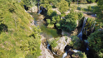 Fototapeta na wymiar View of the waterfall and cliffs in the Korana river. Slunj Rastoke. Croatia. Europe 