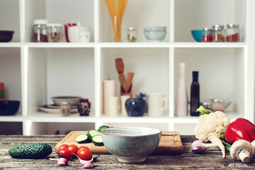 Food cooking background with vegetables. Blurred kitchen background. Healthy food and diet concept.