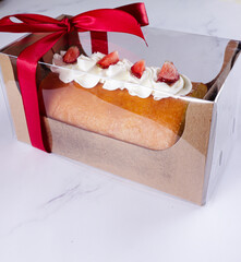 Bolu Gulung or Roll Cake, is an Indonesian version of Swiss roll. A fluffy soft sponge cake rolled with butter cream and garnish with strawberry.