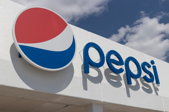 Pepsi logo and signage. Pepsi and PepsiCo are among the largest beverage producers in the world.