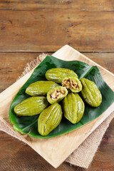 Kue Pepare or papari, traditional cake from Banjarmasin Indonesia, made of glutinous flour and filled with coconut and brown sugar.
