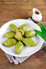 Kue Pepare or papari, traditional cake from Banjarmasin Indonesia, made of glutinous flour and filled with coconut and brown sugar.