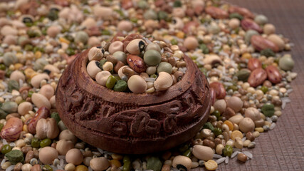 Assorted different types of beans and cereals grains. Set of indispensable sources of protein for a healthy lifestyle. Everyday use at Indian households.