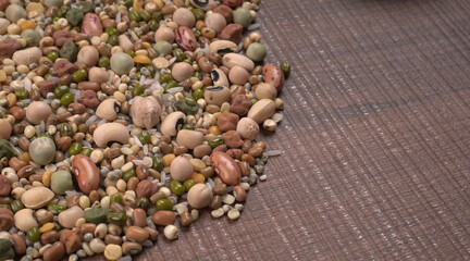 Assorted different types of beans and cereals grains. Set of indispensable sources of protein for a healthy lifestyle. Everyday use at Indian households.