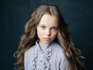 Fototapeta premium beautiful girl fashionable hairstyle posing close-up studio