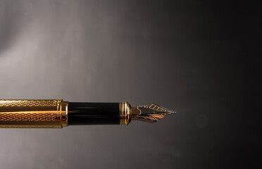Fountain pen, beautiful details of a beautiful fountain pen, dark gradient background, selective...