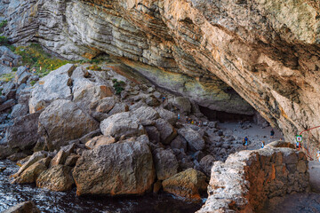 Obraz premium Stone grotto in the rock on the Golitsyn trail in the Crimea. Novıy Svet, Crimea - 3 Sep 2021