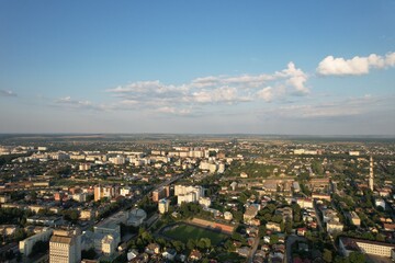 Fototapeta premium Aerial view of the city at sunset. Big city in Ukraine. Panoramic view.
