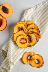 dried peaches on a light background