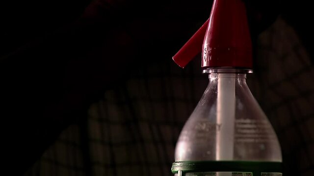 Old Soda Siphon Plastic Bottle in a Bar of Buenos Aires, Argentina. Closeup.  