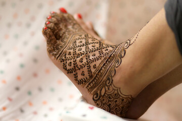 Ledy Feet and Hands in Heena for wedding in white background and isolated hand and feet  | hand design | feet design | beautiful design | nice design 