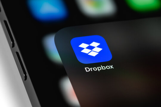 Dropbox mobile icon app on screen smartphone iPhone. Dropbox is file hosting company Dropbox Inc. Moscow, Russia - August 11, 2021