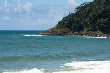 Beautiful beach in the north of Brazil. The rocks limit the beach. Tropical vegetation and crystal...