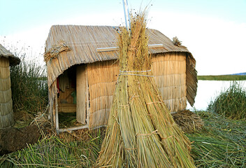 Houses Built with Totora Reeds of Uros Floating Islands on the Lake Titicaca, Puno, Peru, South America	