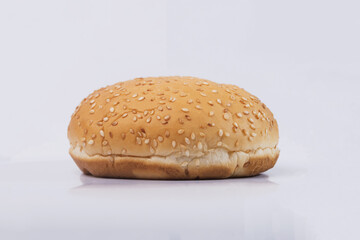 Cheeseburger bun on white isolated background. Two Hamburger buns with sesame isolated on white background