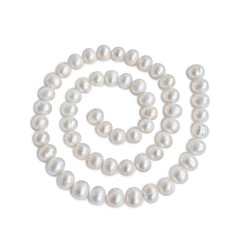 Spiral ornament figure made of pale pearl necklace with shadow, isolated on white background