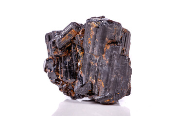 macro mineral stone sherle, schorl, black tourmaline on white background