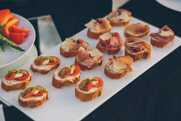 photo of snacks on a buffet banquet table cold snack dishes