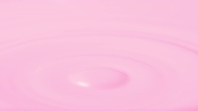 Macro shot of rose milk drop falls down on rose milk surface creating concentric circles on it | Rose milk advertisement