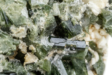 Macro mineral tourmaline stone on white background