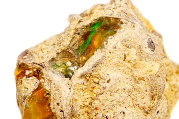 Macro Opal mineral stone in rock on white background