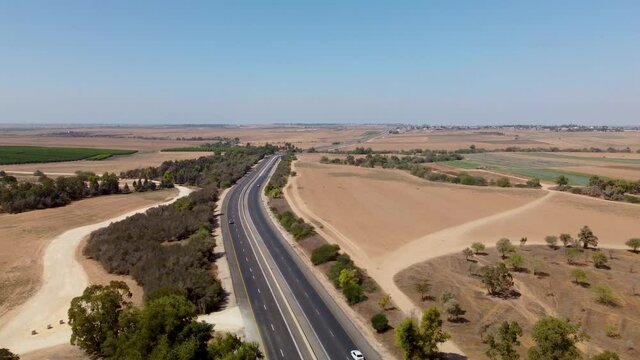 A drone crosses a highway and flies in an arc in southern Israel between Netivot and Sderot