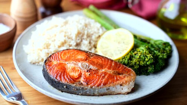 baked salmon with brown rice and broccolini 