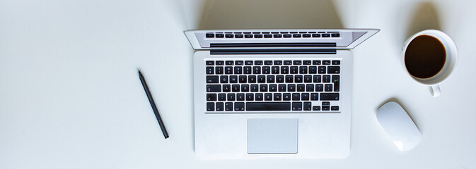 top view of workspace with laptop and mouse minimalist design