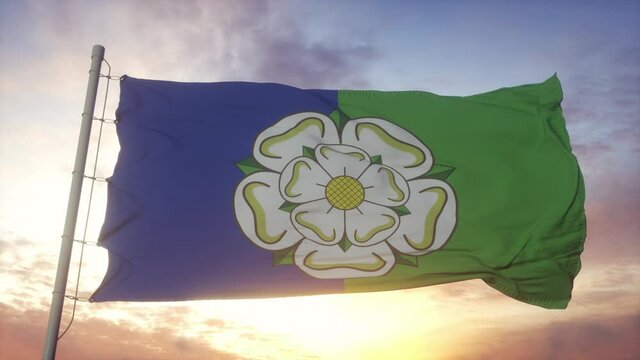 East Riding of Yorkshire flag, England, waving in the wind, sky and sun background
