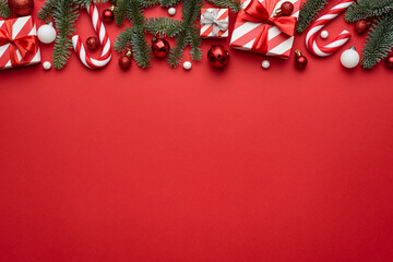 Red Christmas background with border decorated with holiday gifts