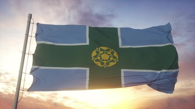 Derbyshire flag, England, waving in the wind, sky and sun background